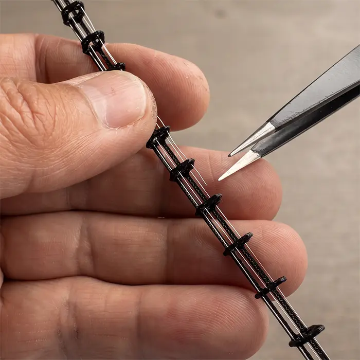 Close-up of a manufacturing step in the production of the in-akustik AIR tonearm cable