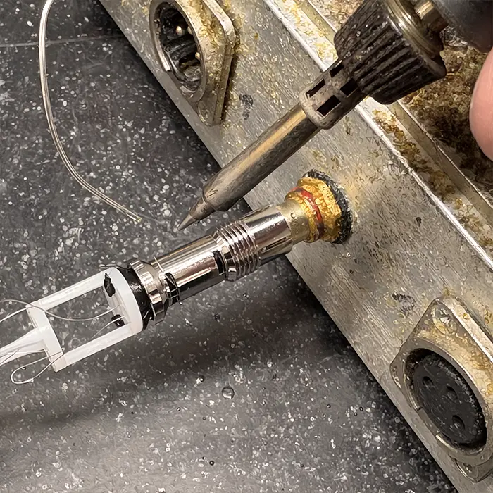 Close-up of a manufacturing step in the production of the in-akustik AIR tonearm cable