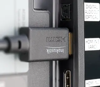 The in-akustik Star Series Ultra High Speed HDMI Cable connected to a TV
