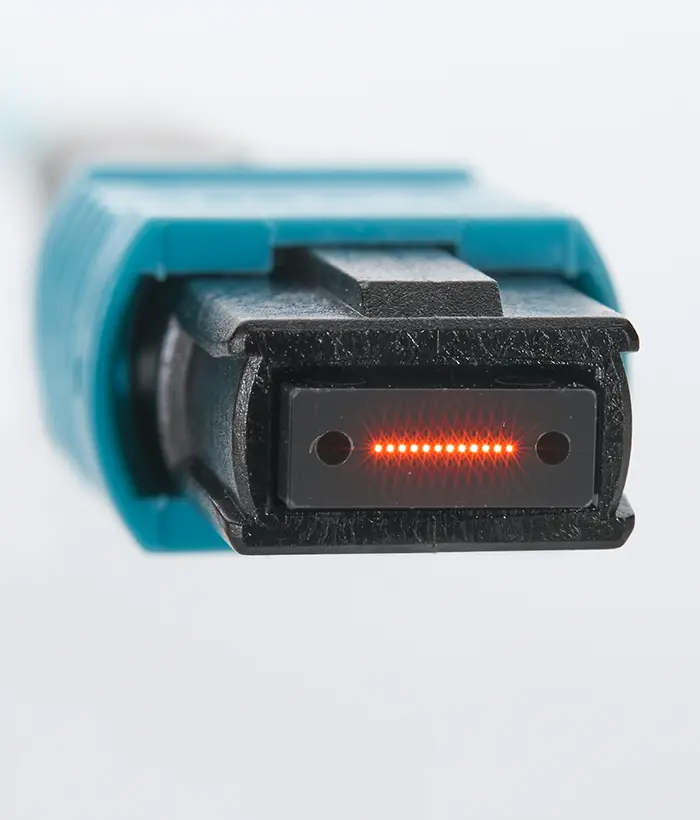 Close-up of the HDMI connector of an optical fiber cable featuring MPO technology