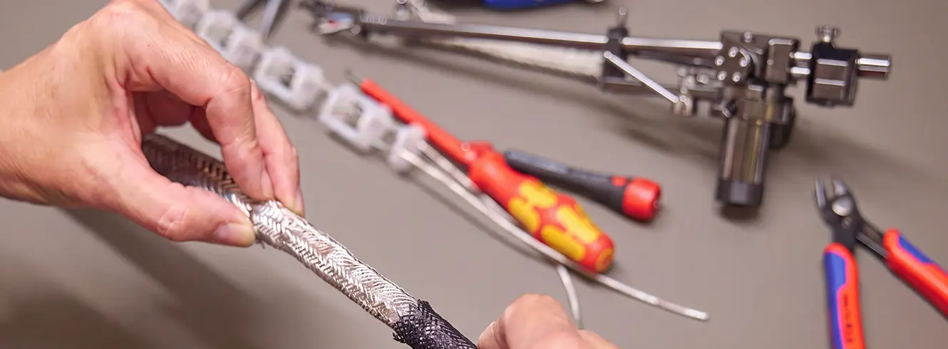 Close-up of a manufacturing step in the production of the in-akustik AIR tonearm cable